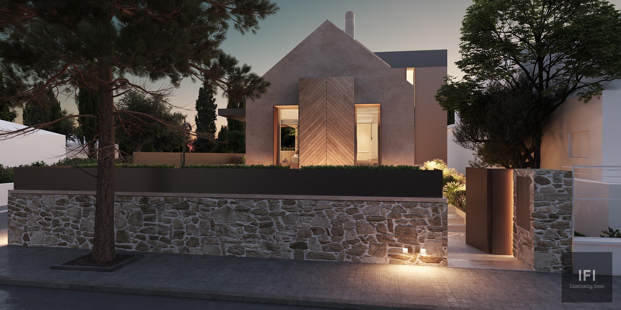 exterior image of a residence with exterior lights and stone fence